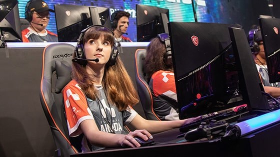 Megan Danaher playing “Overwatch” at the Hall of Fame: Worlds Collide event in 2020. 