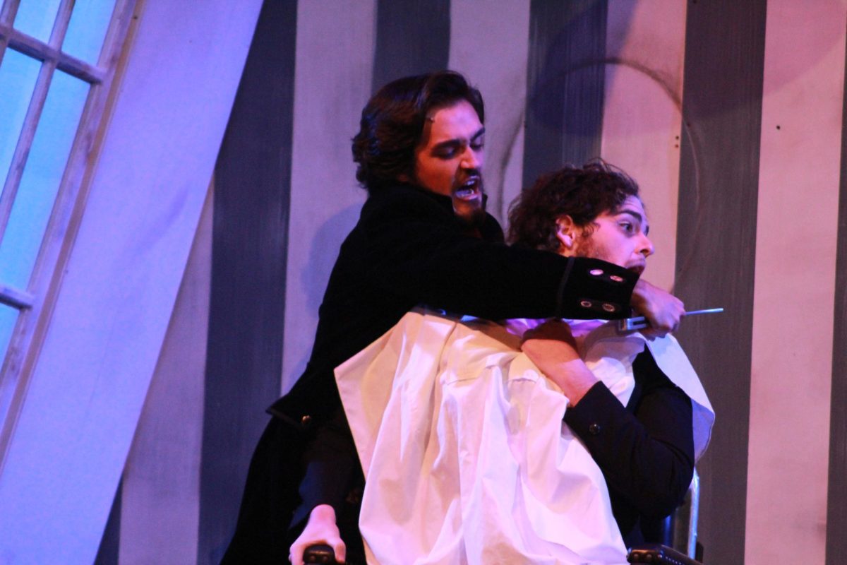 Sweeny Todd, played by Zach Sullivan and Judge Turpin played by CJ Zimmer