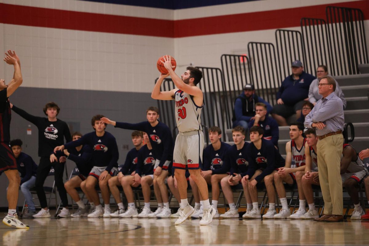 Cole Crubel shooting a three 