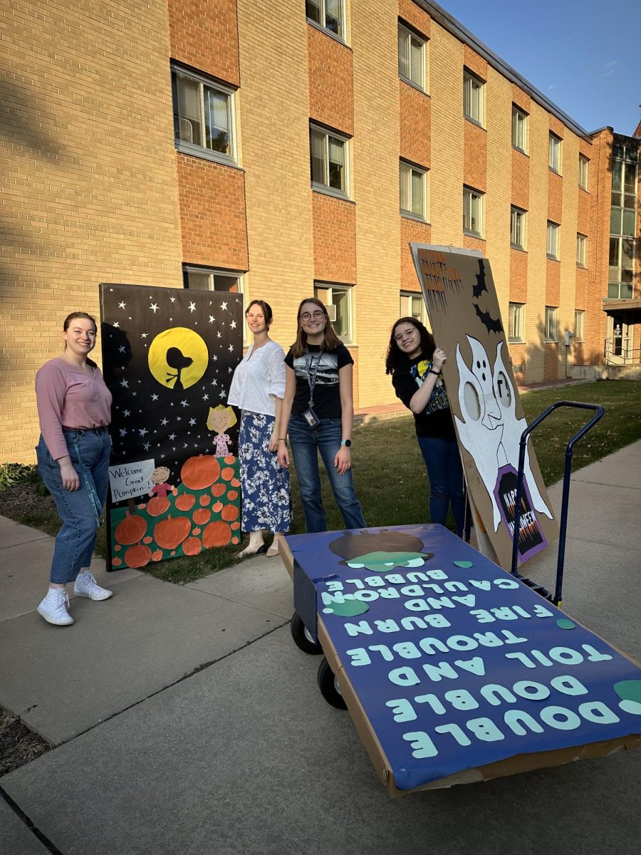 Education Club members Lindsay Koza, Felicia Sedbrook, Isabelle Carr, and Sophia Creary-De La Cruz are preparing for Safe Trick or Treat